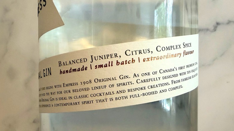 Close-up of the back label on a bottle of Empress 1908 Original Gin