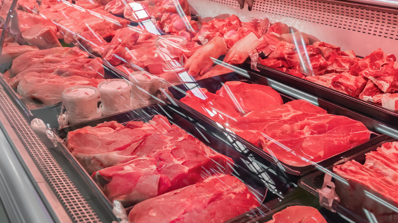 different cuts of beef in a butcher's counter display