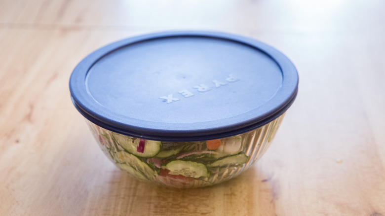 cucumber salad in covered container