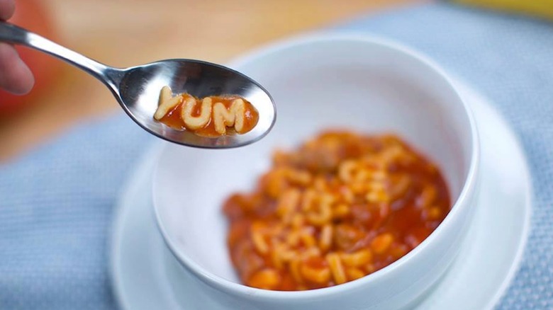 Chef Boyardee pasta shapes reading 'YUM'