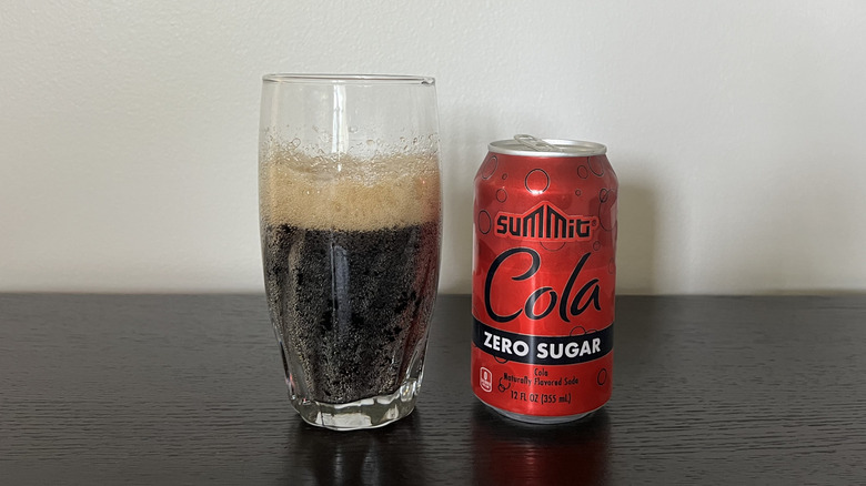 Aldi Summit zero sugar cola in a glass.
