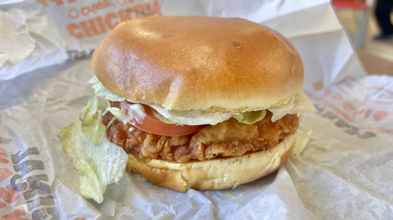 Royal Crispy Chicken with tomato on a wrapper