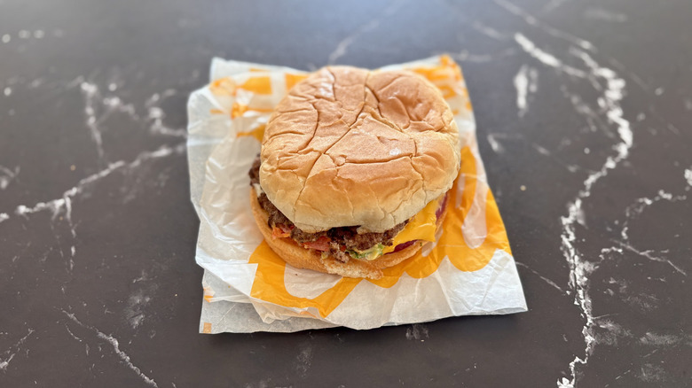 Culver's deluxe burger on countertop