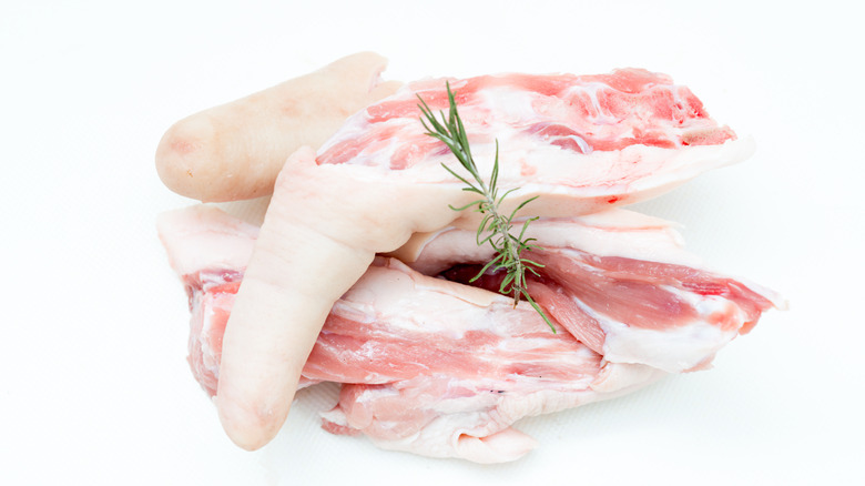 raw pork tails with rosemary