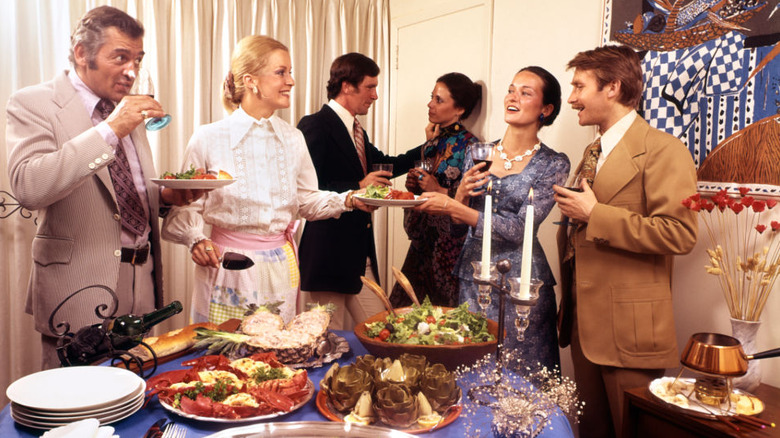 photograph of retro dinner party