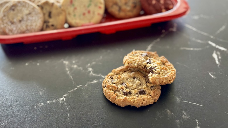 Costco coconut almond chunk cookies in front of cookie tray