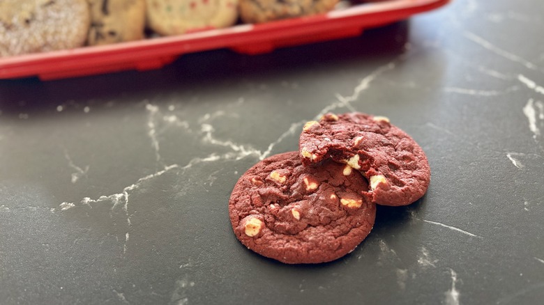 Costco red velvet cookies in front of cookie tray