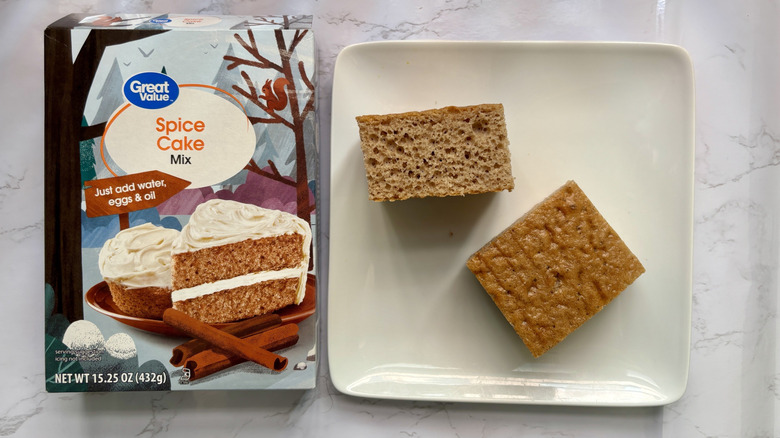 Two pieces Great Value spice cake on plate next to box of spice cake mix