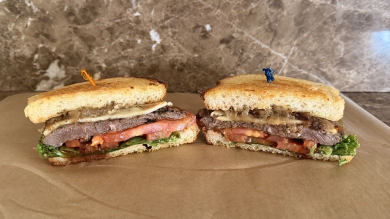 Habit's Sirloin Steak Sandwich cut in half