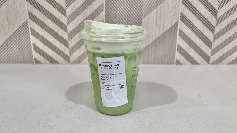 Caramel protein matcha in a cup