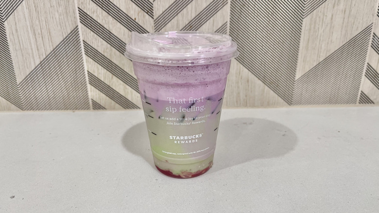Iced Double Berry Matcha in a plastic cup