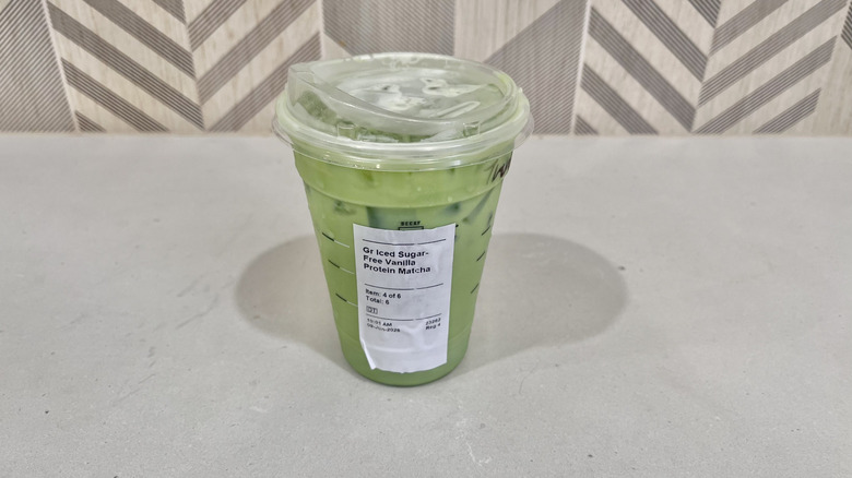 Sugar-Free Vanilla Protein Matcha in a plastic cup