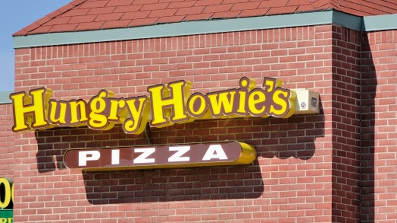 Hungry Howie's pizza building with a sign