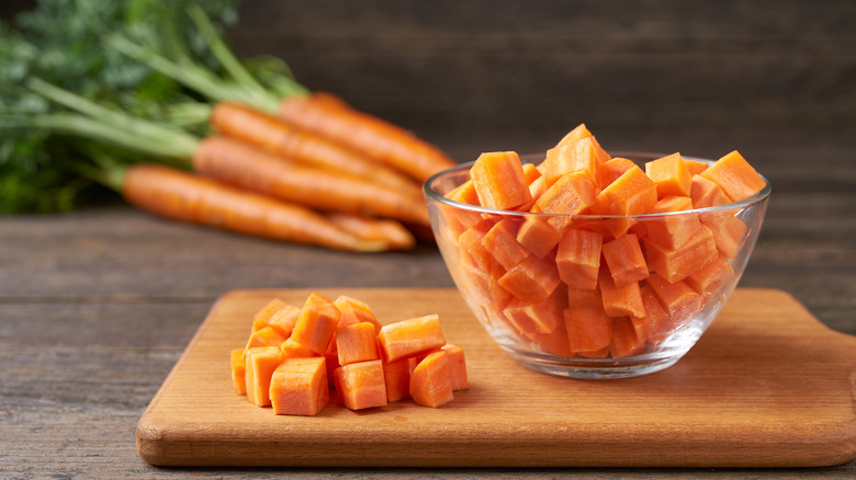 Chopped carrots on cutting board