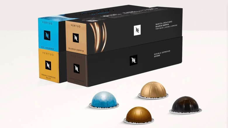 Nespresso Double Espresso Discovery Pack boxes and capsules on white surface