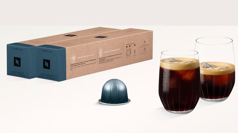Nespresso Cold Brew Variety Pack pods next to glasses of coffee on white background
