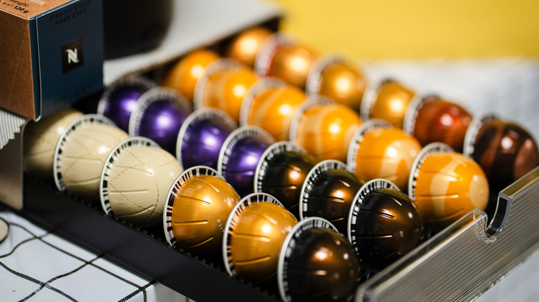 Variety of Nespresso Vertuo pods in drawer pod holder