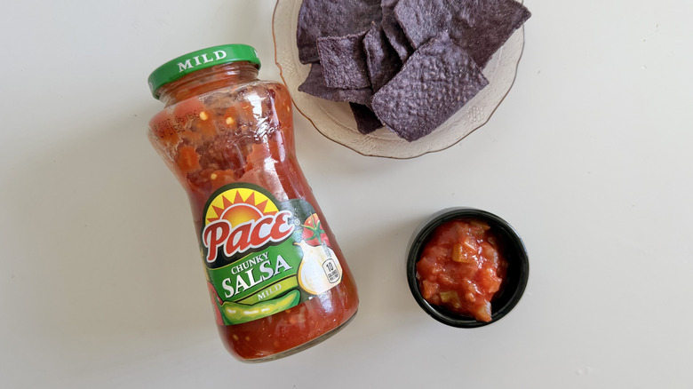 Jar of Chunky Mild salsa on a table