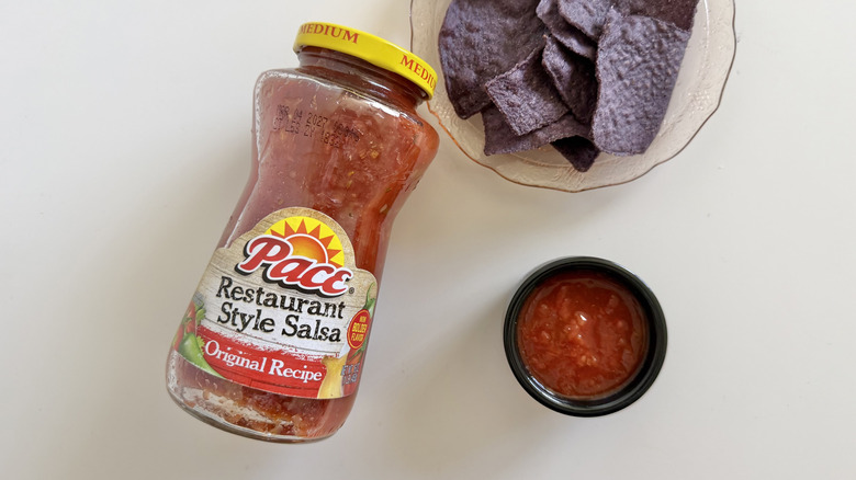 Restaurant Style Original salsa jar next to chips