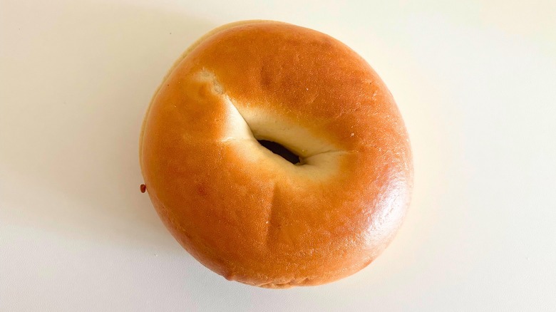 Top-down shot of Panera Plain bagel on white surface