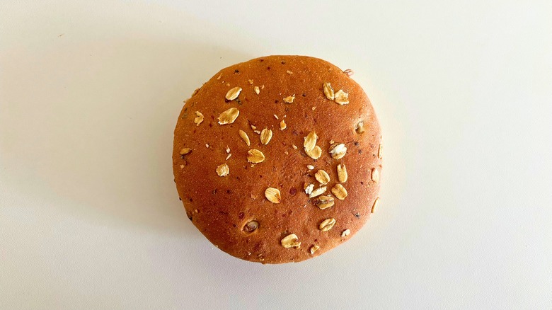 Top-down shot of Panera Multigrain bagel on white surface