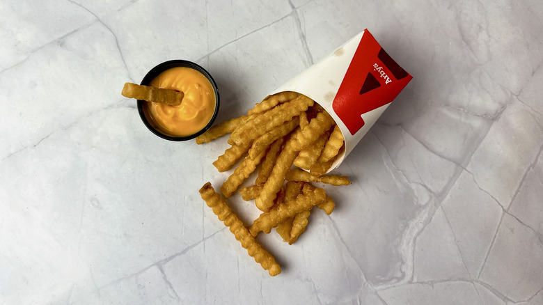 Arby's cheddar cheese sauce and french fries