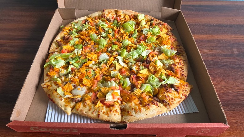 Casey's taco pizza in a pizza box