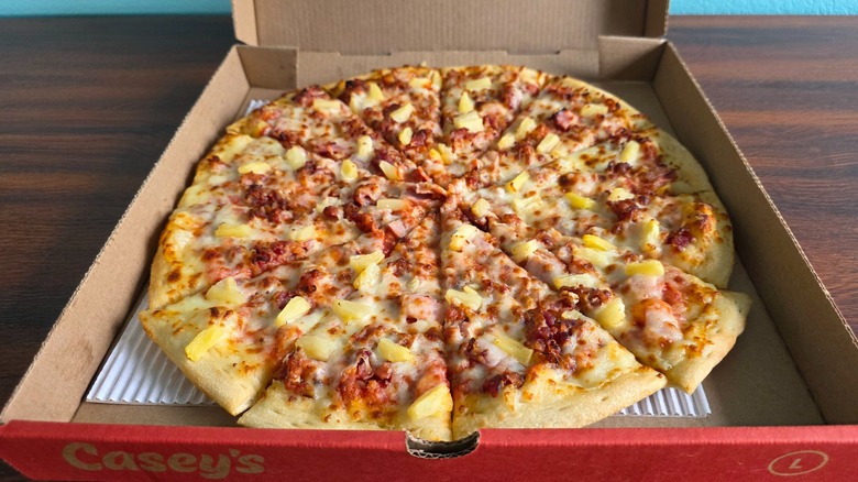 Casey's ultimate Hawaiian pizza in a pizza box