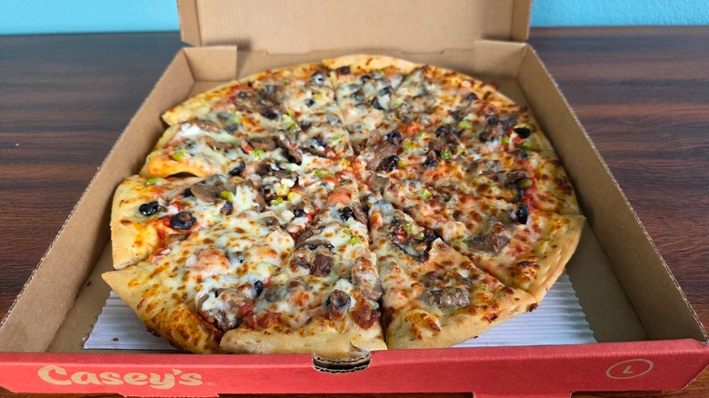 Casey's veggie pizza in a pizza box