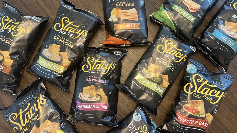 10 Stacy's pita chip bags laid out on table.