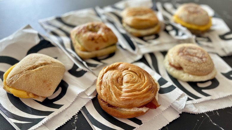 Various Starbucks breakfast sandwiches on wrappers