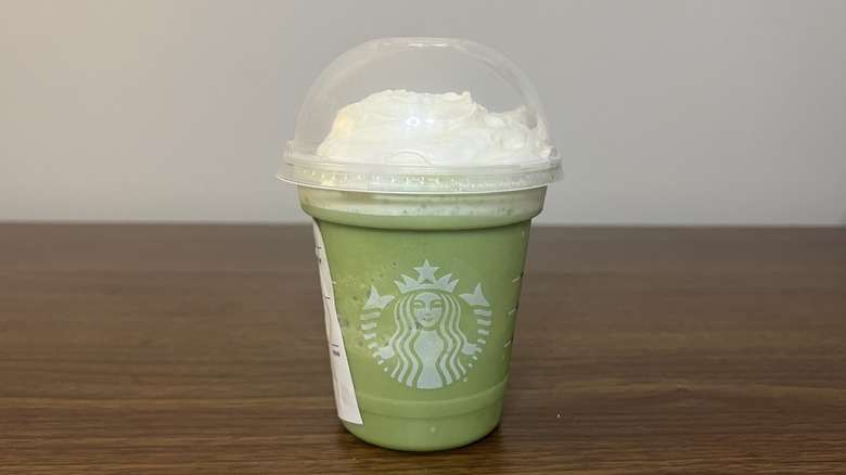 Starbucks Matcha Creme Frappuccino in to-go cup.