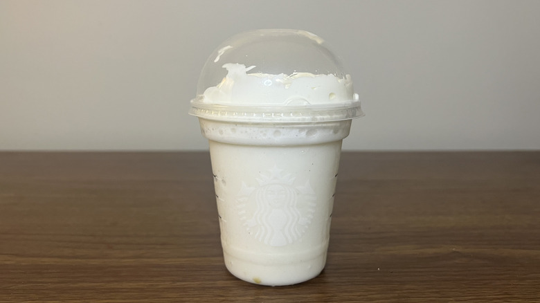 Starbucks v Creme Frappuccino in to-go cup.