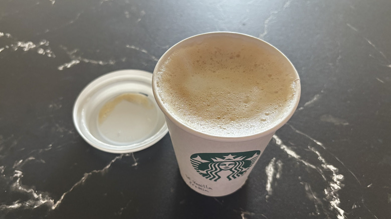Starbucks sugar-free vanilla protein latte with lid removed from cup