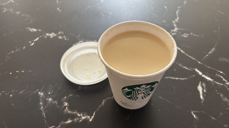 Starbucks white chocolate mocha with lid removed from cup