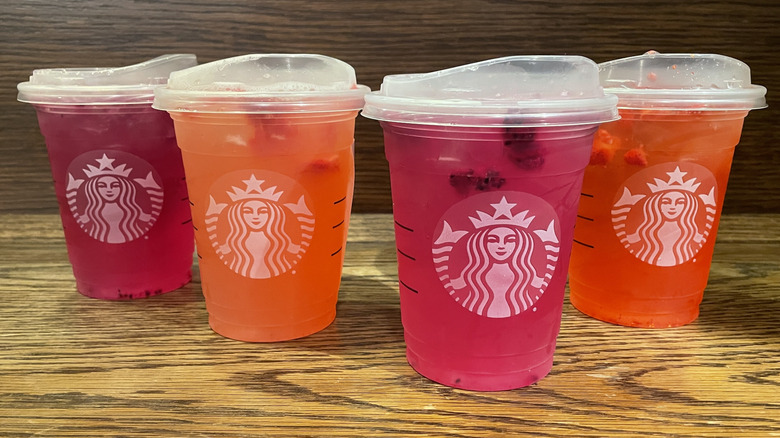 A lineup of Starbucks Refreshers on a table