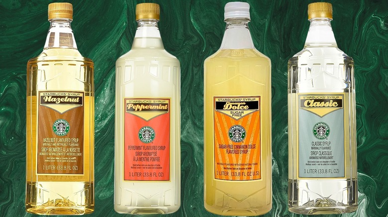 Four Starbucks syrups on green background