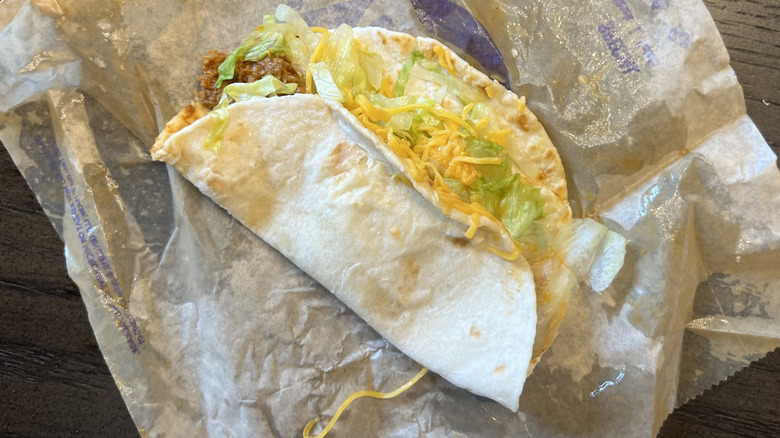 Taco Bell soft taco on wrapper.