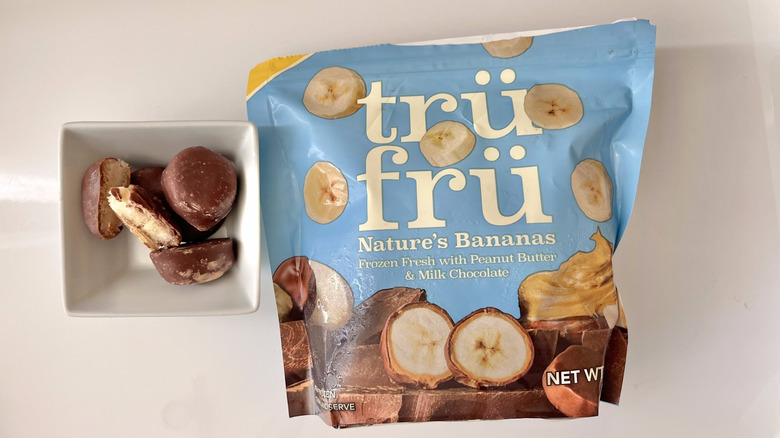 Frozen Bananas in Peanut Butter & Milk Chocolate in a small dish