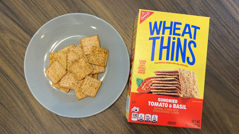 Sundried Tomato & Basil Wheat Thins on a plate.