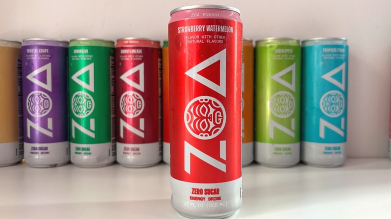 Can of Strawberry Watermelon ZOA energy drink on white table, other cans behind
