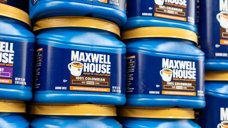 Maxwell House coffee containers displayed on store shelves