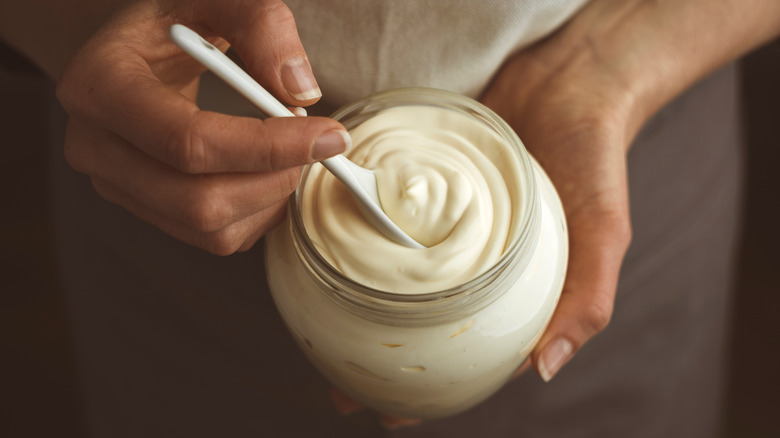 Jar of mayonnaise with spoon