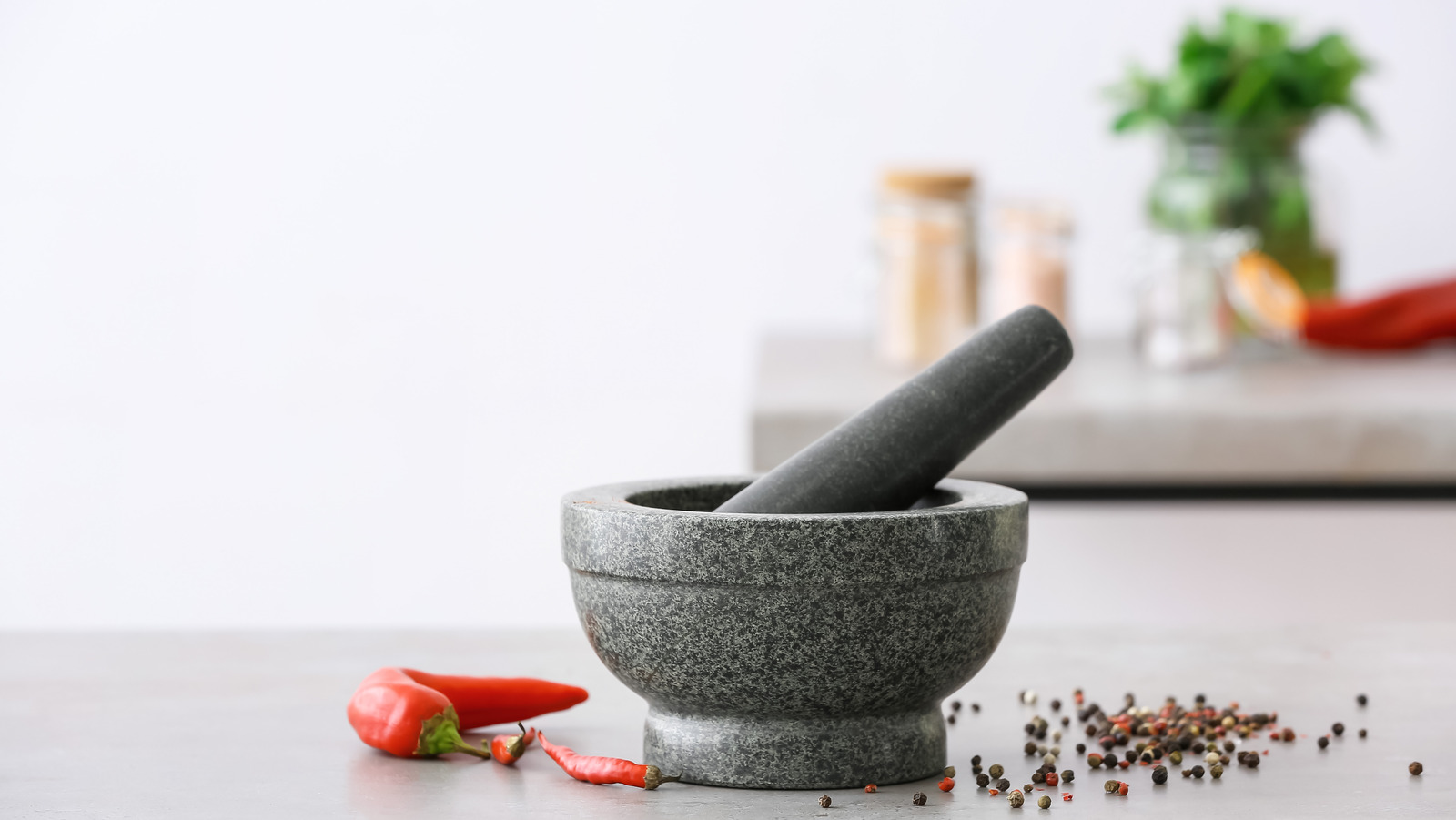 https://www.tastingtable.com/img/gallery/everything-you-need-to-know-about-the-mortar-and-pestle/l-intro-1663601655.jpg