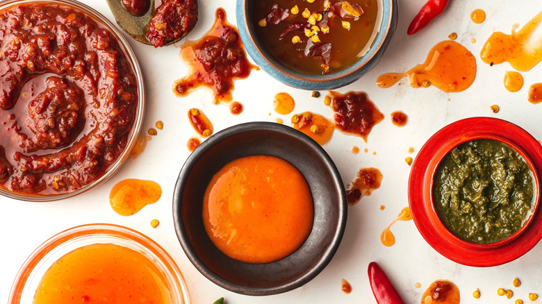 Various hot sauces in different dishes