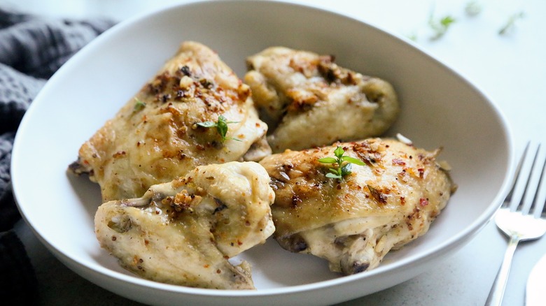 expertly marinated baked chicken plated