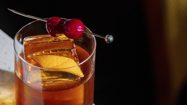 Cocktail with cherries as a garnish