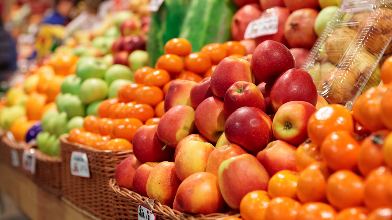 Fruits on display in produce section at market