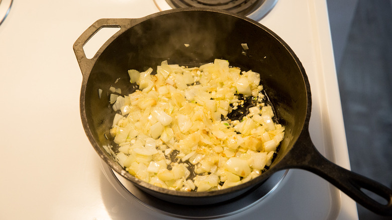 onion sauteing in pan