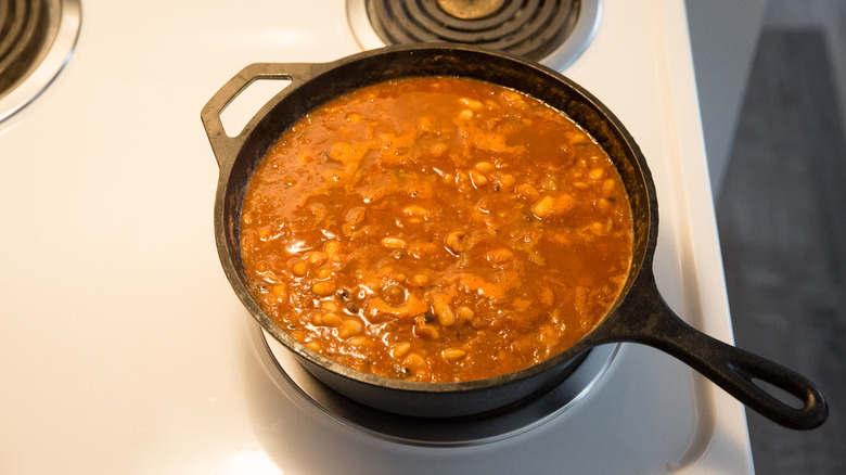 baked beans simmering on stove